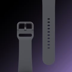 Bracelet Graphite Galaxy Watch5 pos&eacute; &agrave; plat montrant le d&eacute;tail et le design de la bande.