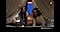 Two women smile and wave to come inside a beige cloth draped like a tent indoors as someone records a video of them. The room is dimly lit but the detail and color of the video is clear and balanced thanks to Nightography on the Galaxy S23 FE’s rear camera. Text reads Captured by Galaxy S23 FE #withGalaxy.