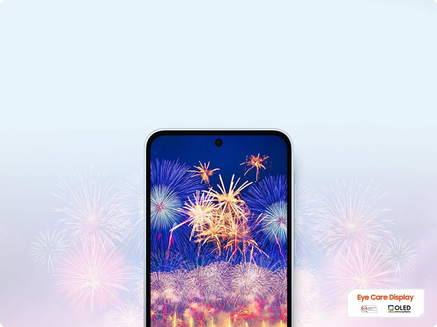 A smartphone showcasing a vibrant display of fireworks on the screen. With an 'Eye Care Display' and OLED technology logo.
