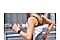 A woman's wrist is shown in the middle of running in the city. She is wearing a black Galaxy Watch FE, which displays the time, the duration of exercise, the calories burned, and her heart rate.
