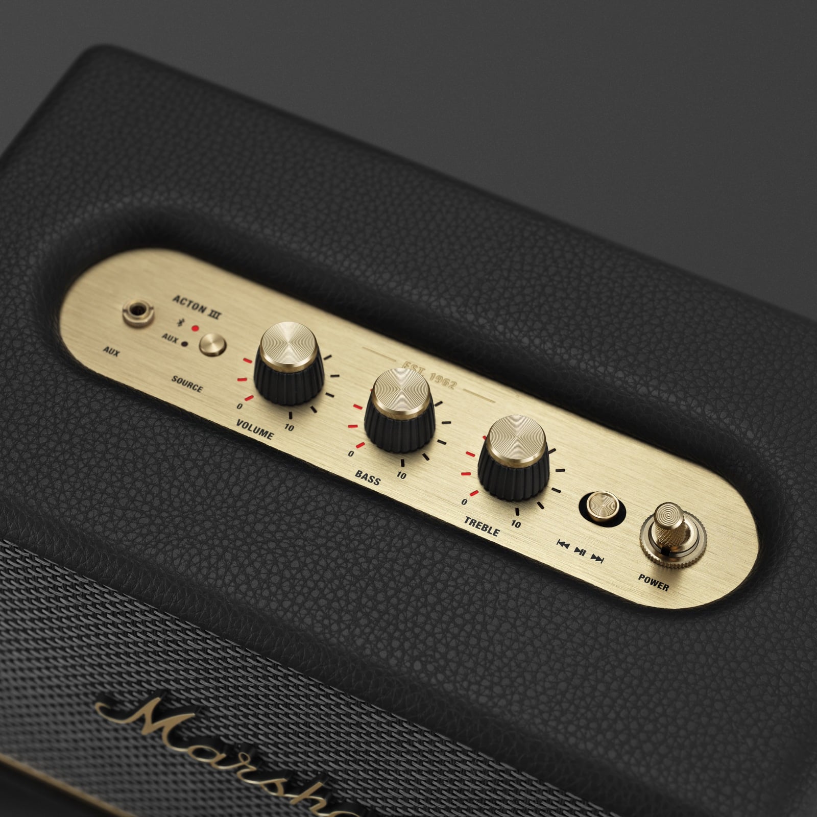 Gros plan sur un Marshall ACTON III BLACK avec un haut-parleur noir élégant.