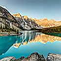 Image montrant des montagnes se refl&eacute;tant sur un lac