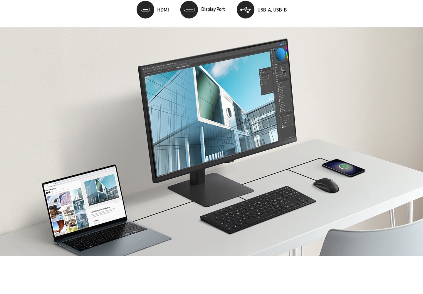 Un ordinateur portable, un moniteur, un clavier, une souris et un t&eacute;l&eacute;phone portable sont tous connect&eacute;s sur un bureau par un fil. Au-dessus du moniteur, il y a 3 ic&ocirc;nes&nbsp;: HDMI, port d&rsquo;affichage, ports USB-A et USB-B.