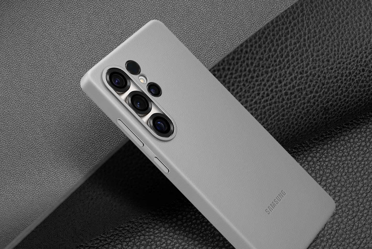 A diagonally placed Kindsuit Case is shown in all four colors: Black, Light Blue, Gray and Camel.