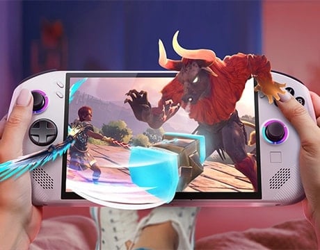 Hands holding Lenovo Legion Go S Gen 1 (8") gaming handheld playing a fantasy game with a hero battling a minotaur.