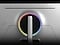 The back panel of a monitor has a circle in the center showing different colors. The colors circulate multiple times.