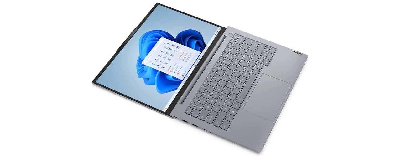 Vue lat&eacute;rale gauche de l&rsquo;ordinateur portable Lenovo ThinkBook&nbsp;14 Gen&nbsp;8 (Intel 14&nbsp;pouces) ouvert &agrave; 180&nbsp;degr&eacute;s, mettant en valeur son design flexible et son profil fin.