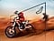 A dirt bike racer looks clear and visible inside the TV screen because of TV motion xcelerator technology.