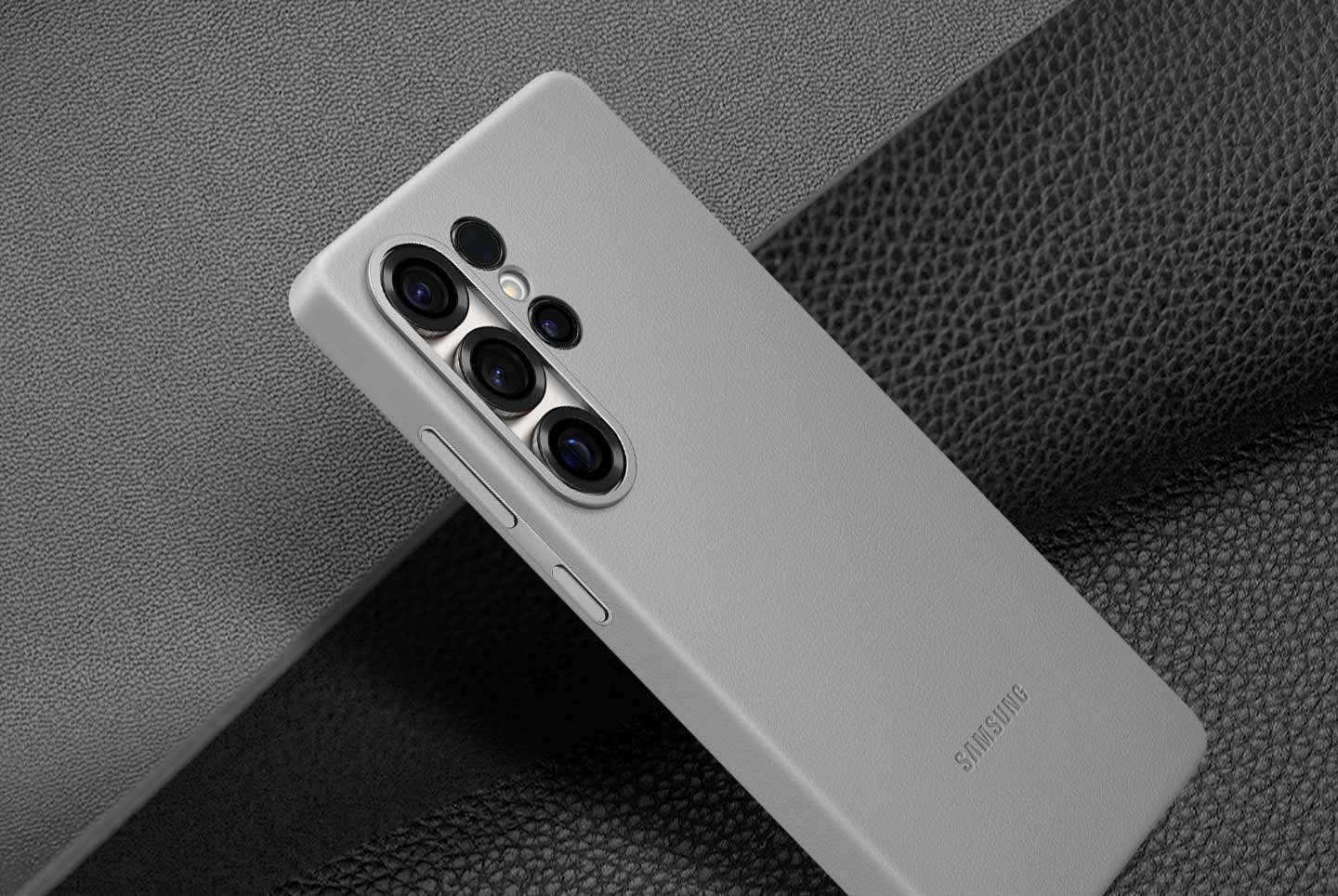 A diagonally placed Kindsuit Case is shown in all four colors: Black, Light Blue, Gray and Camel.