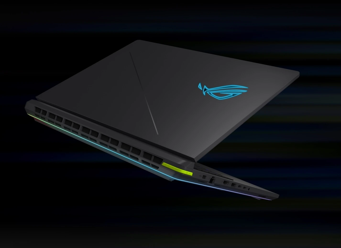 Un ordinateur portable ROG Strix avec le couvercle partiellement ouvert.