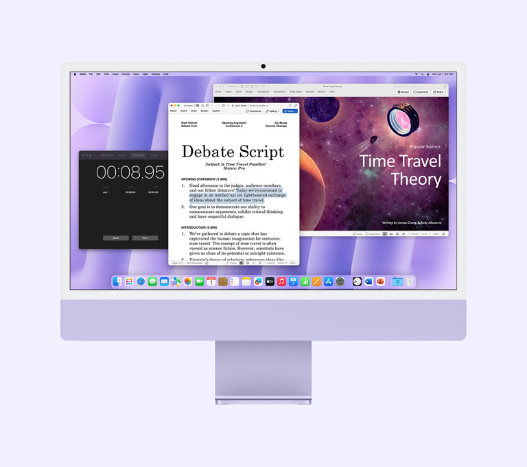 iMac mauve : l&rsquo;&eacute;cran affiche les apps Microsoft Word, Microsoft PowerPoint et Horloge.