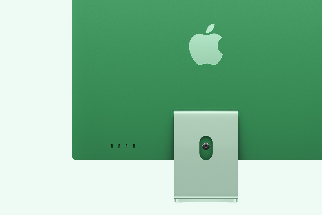 Vue de l&rsquo;arri&egrave;re d&rsquo;un iMac vert mettant en &eacute;vidence les 4 ports USB‑C 