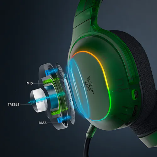 Close-up of gaming headset with &Eacute;CLAIRAGE RGB, showing internal audio driver with labeled treble, mid, bass components.