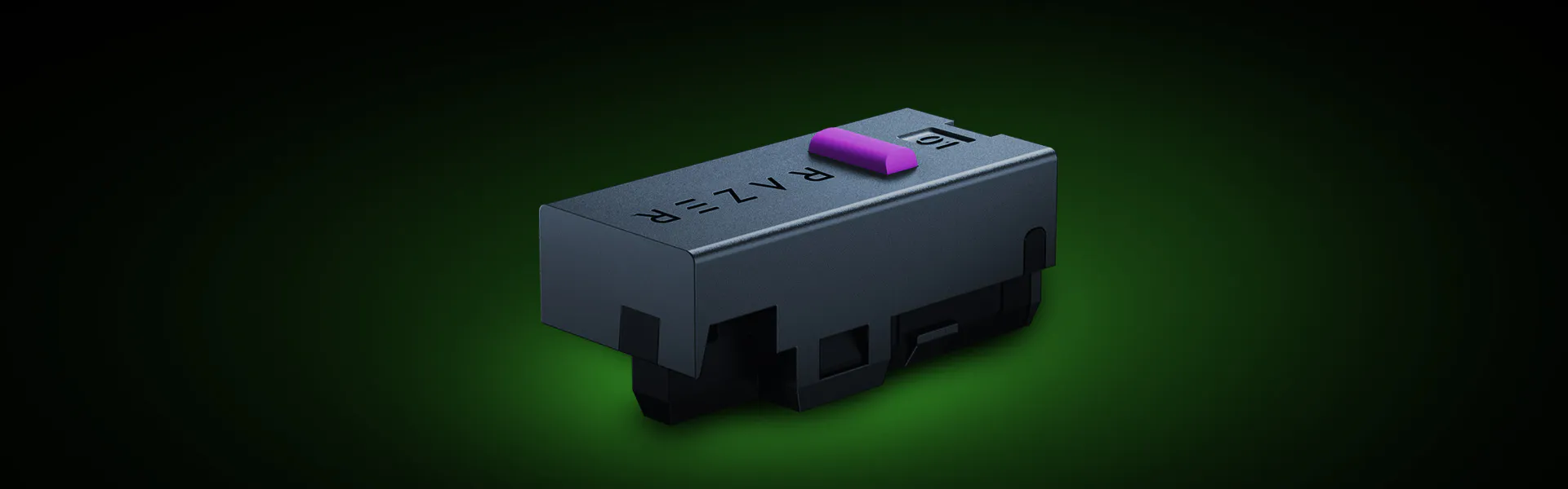 Gros plan d'une cartouche de toner laser noire avec &laquo; R-ALF &raquo; et une languette violette, sur un fond d&eacute;grad&eacute; sombre.