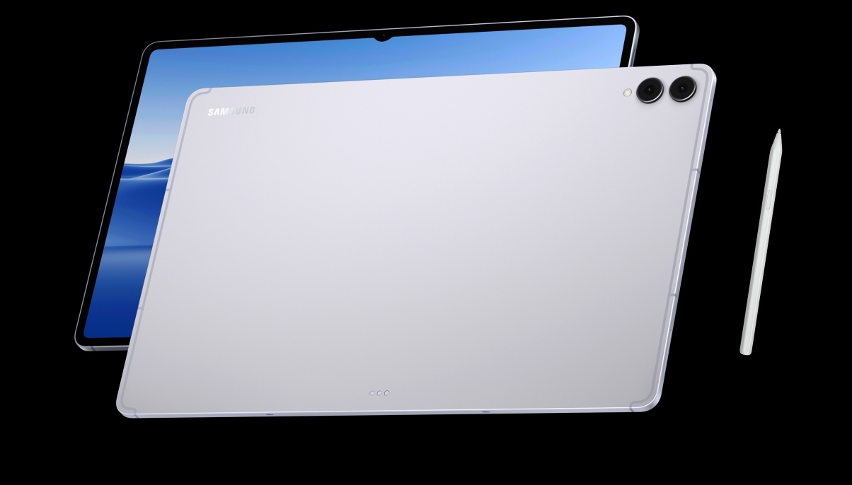 A Galaxy Tab S11 Ultra device in Silver angled to show its rear camera and S Pen, is placed in front of another Tab S11 Ultra device facing up with a colorful wallpaper on display, highlighting the sleek design.
