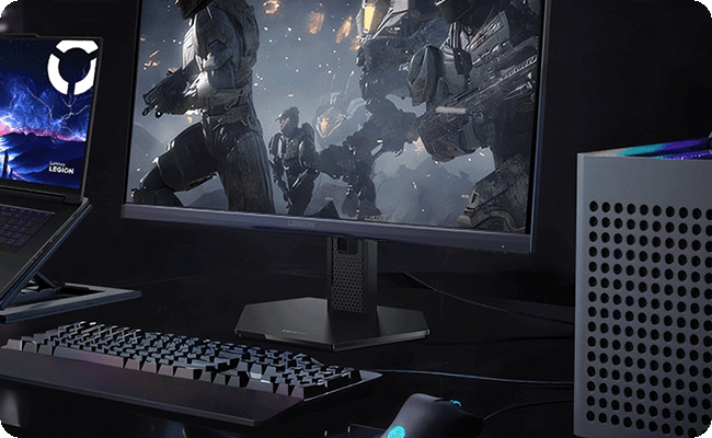 Un ensemble complet d'équipements de jeu électronique de bureau, démontrant la fonction de connexion multiappareilsdu moniteur Legion.