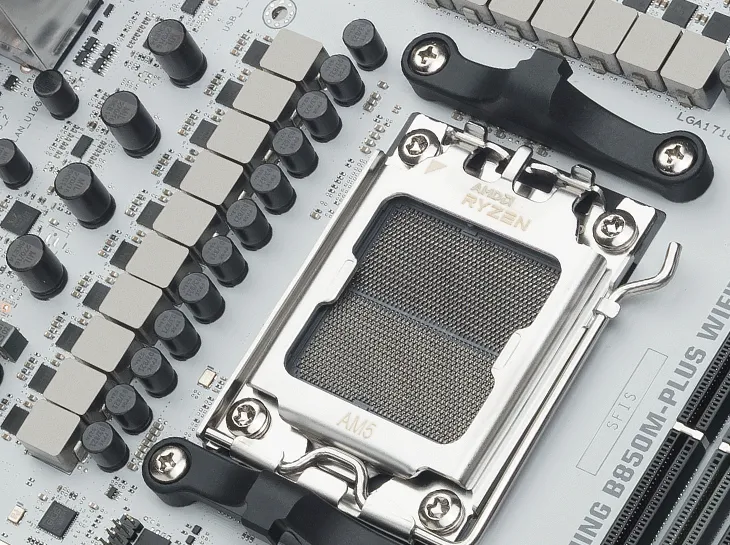 Close-up of an AM5 CPU socket on TUF GAMING B850M-PLUS WIFI7 W.