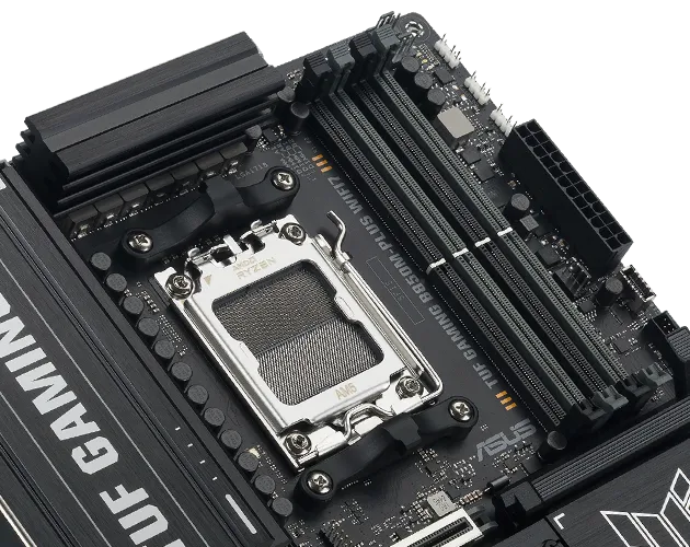 Close-up of TUF GAMING B850M-PLUS WIFI7 showing DDR5 memory slots with a label indicating support for DDR5 modules up to 8000+ MT/s (OC).
