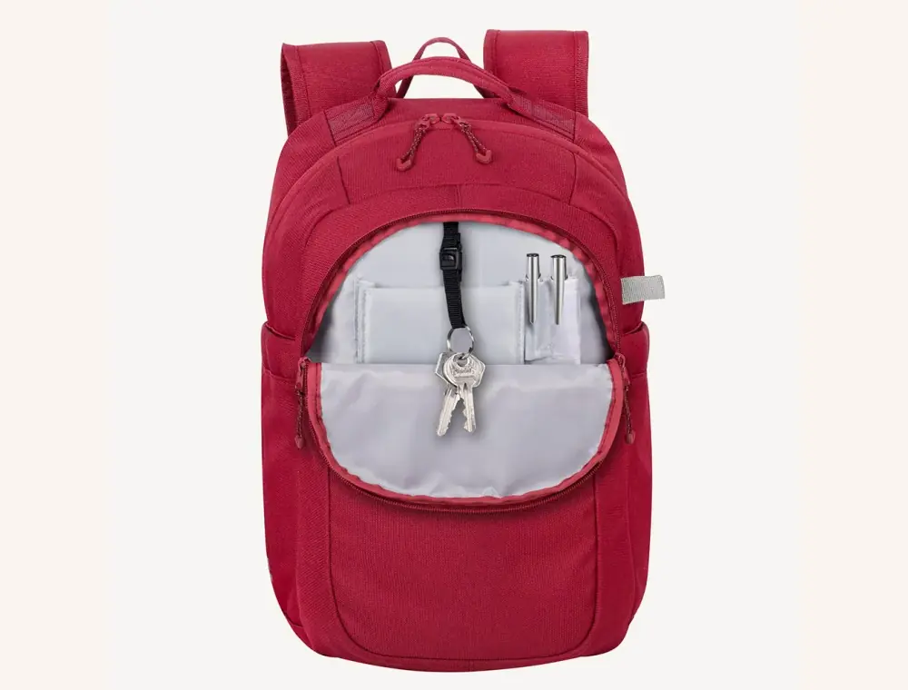 Poche avant ouverte du sac Rivacase 5432 rouge, panneau organiseur avec stylos et clés accrochées