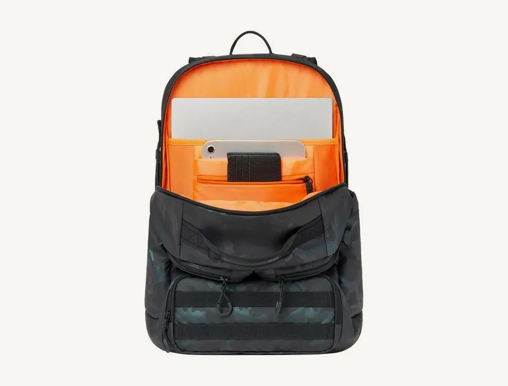 Rivacase Sherwood 7663 backpack opened, orange lining, laptop and tablet in their sections