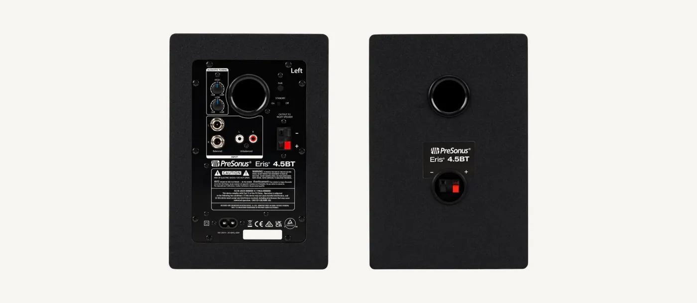 Faces arrière des Eris 4.5BT : entrées TRS et RCA, bouton d'appairage et prise secteur sur l'active, simple bornier sur la passive