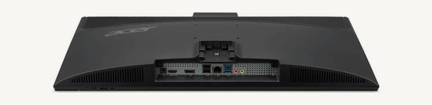 Dessous de l'Acer Aspire C24 : panneau de connectique avec alimentation, HDMI, DisplayPort, ports USB et prise réseau RJ45