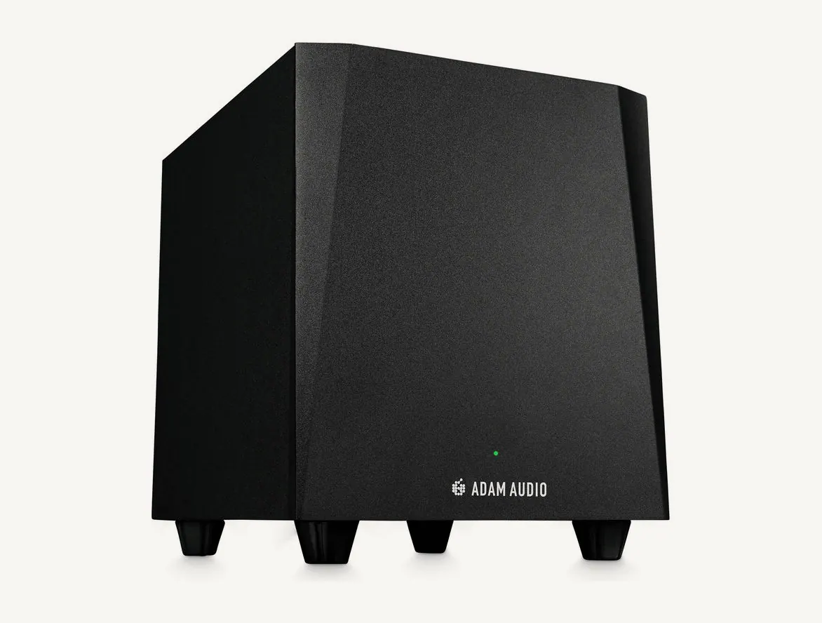 Caisson de basses ADAM Audio T10S noir vu de trois quarts, posé sur quatre pieds en caoutchouc
