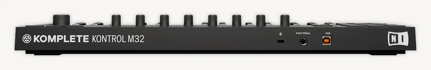 Face arrière du Komplete Kontrol M32 : encoche Kensington, prise FOOT PEDAL et port USB
