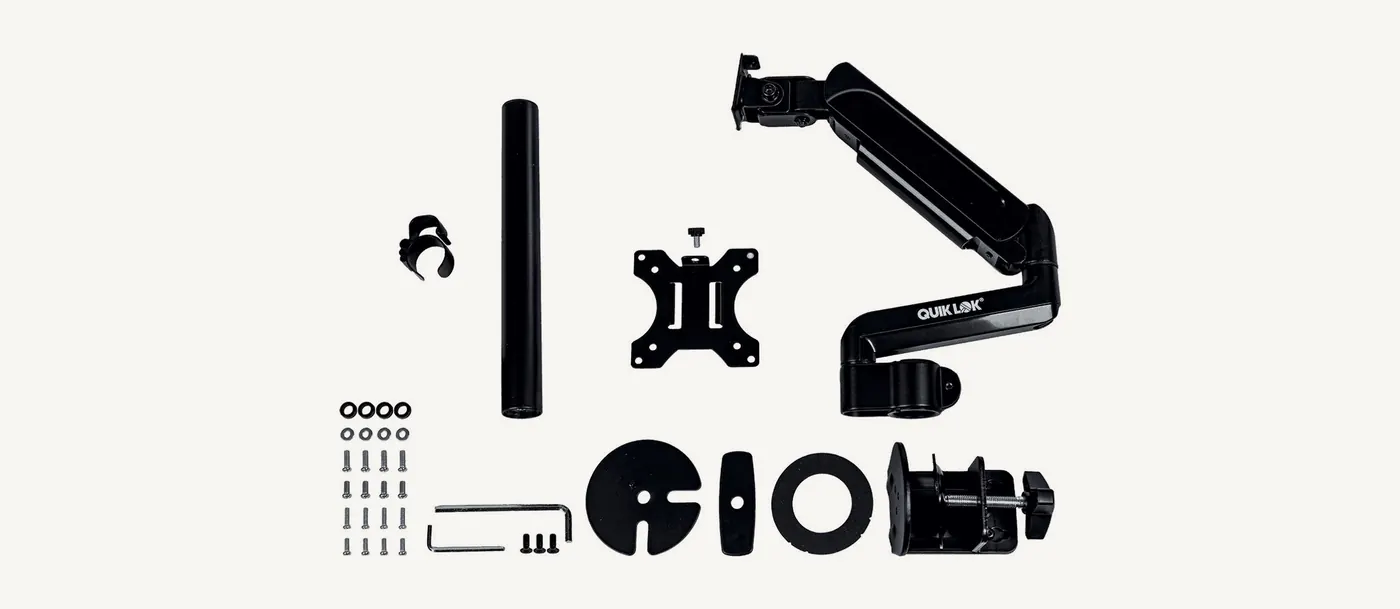 Contenu de la boîte du Quik Lok VSC/001 : bras, colonne, plaque VESA, pince, pièces du passe-bureau, visserie et clés Allen
