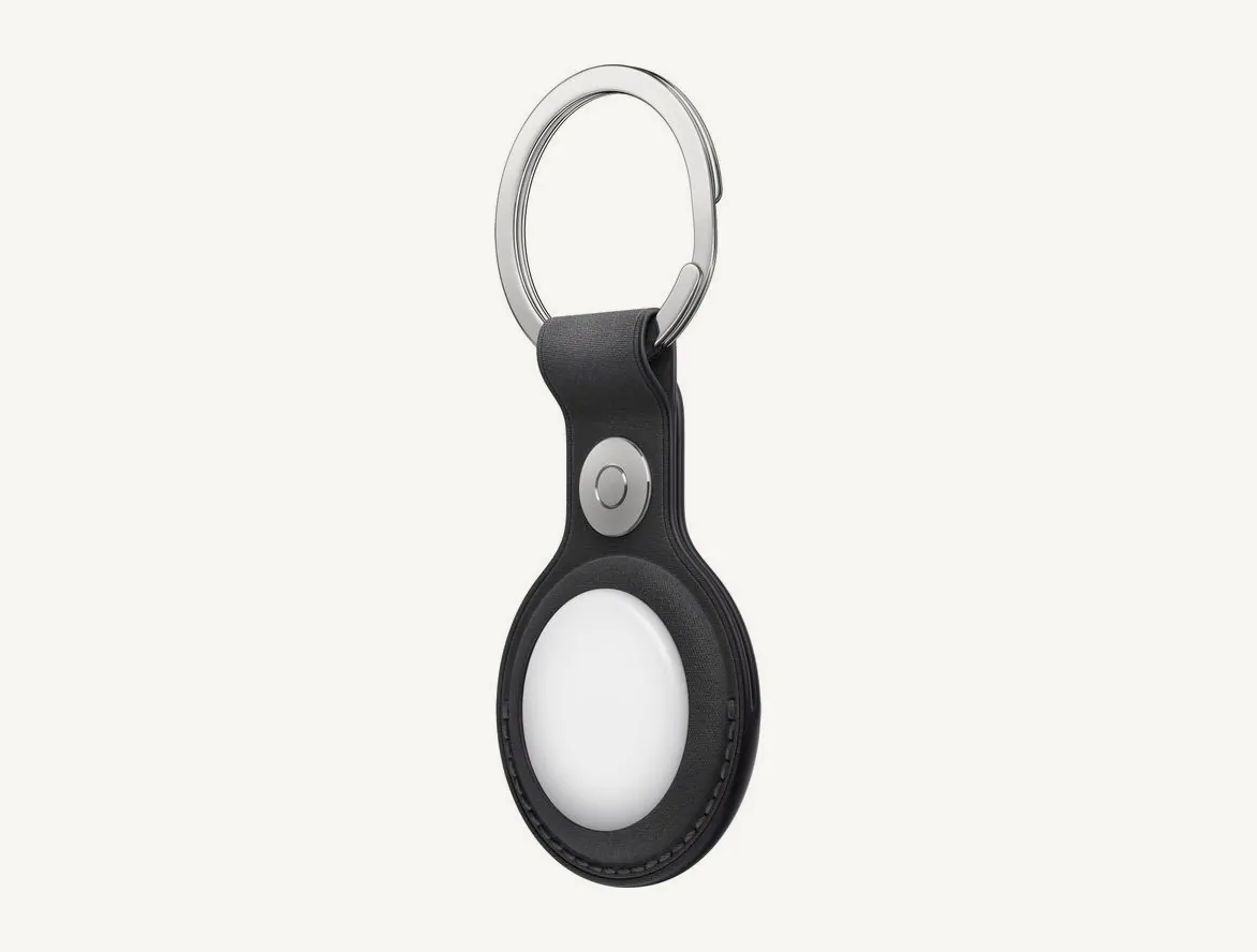 Dos du porte-clés Apple en tissage fin, découpe circulaire laissant voir l'AirTag